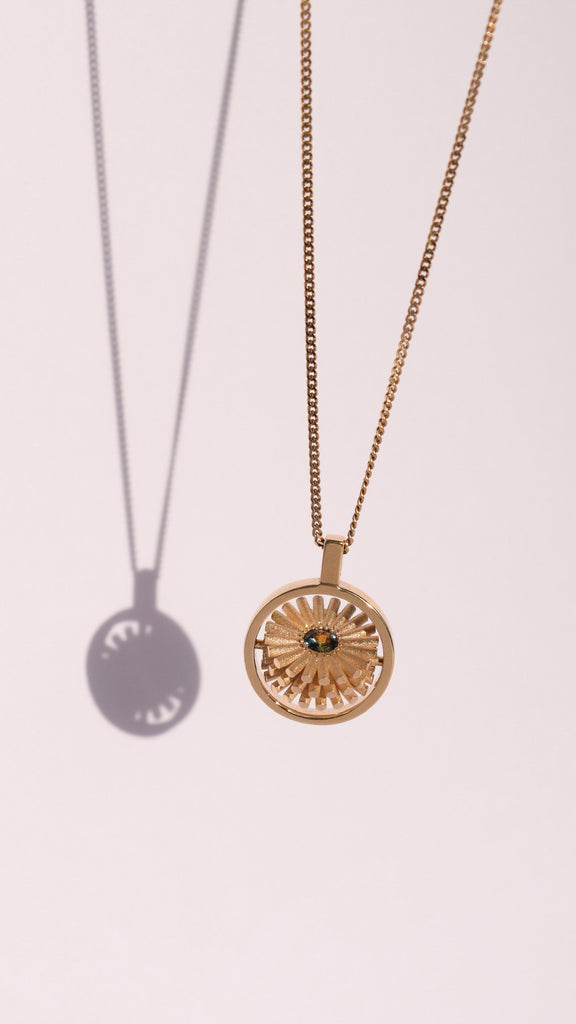 DOUBLE SIDED SPINNING SUN NECKLACE